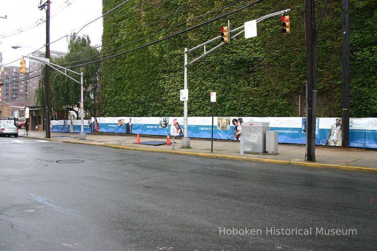 Digital color image of the Maxwell House Coffee plant site with printed vinyl fence sign banners, Hoboken, October 2004. picture number 1