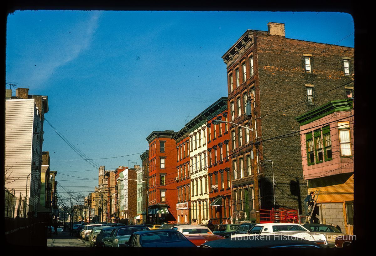 Color slide of eye-level view of row houses on the E side of Adams between 4th and 5th looking N picture number 1