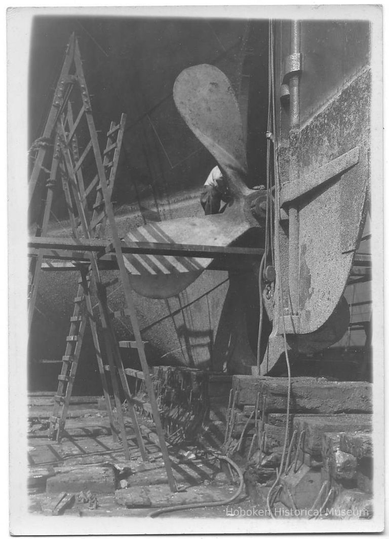 B+W photo of repair on the steerage of an unknown ship in dry dock, Hoboken, no date, ca 1940. picture number 1