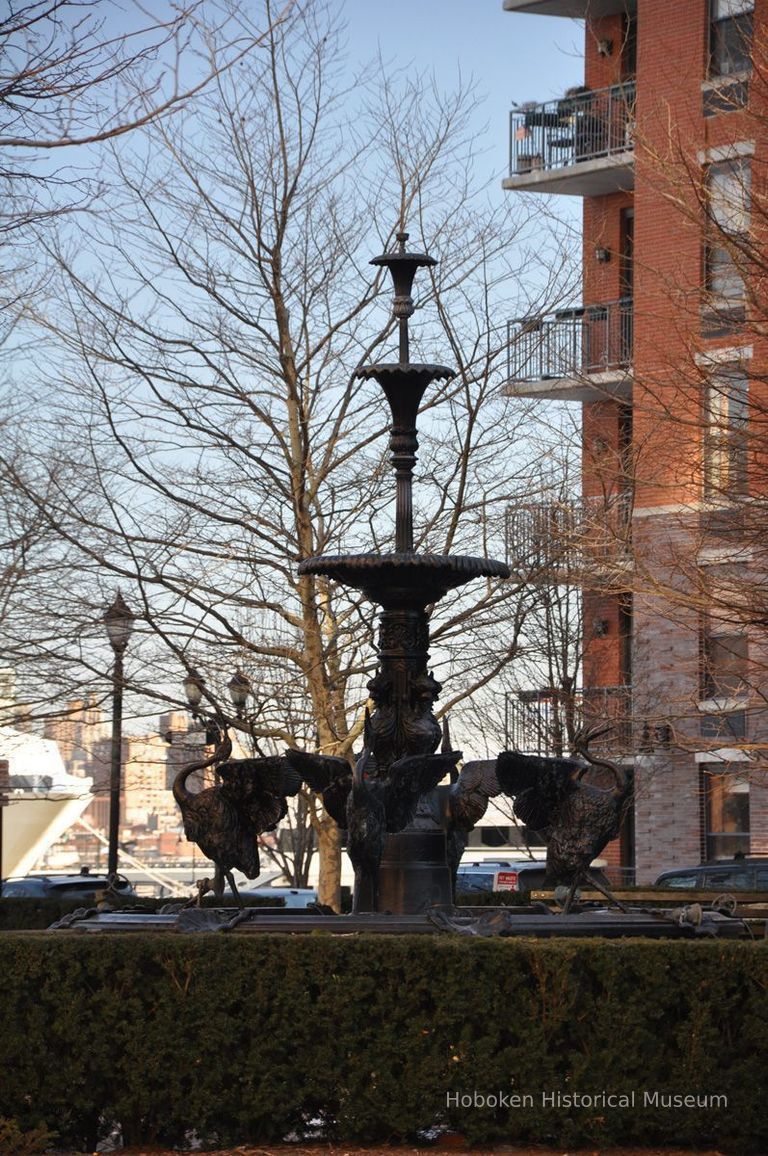 view of fountain is southeast; building at right is 1 Independence Court