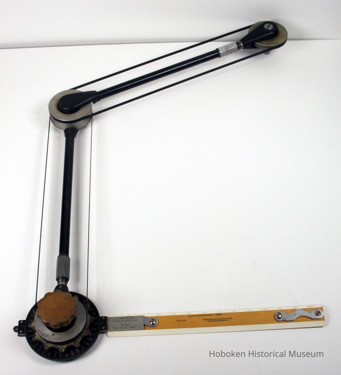 drafting or plotting machine with shorter scale
