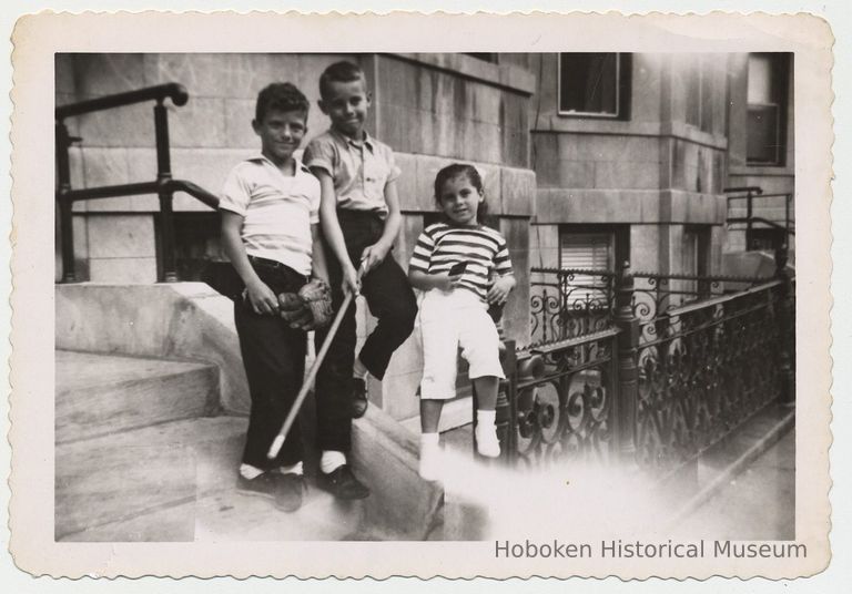 B+W photo of Tommy O'Connell, George & Cheryl Miller on front steps of 1235 Park Ave., Hoboken, n.d., ca. early 1950s. picture number 1