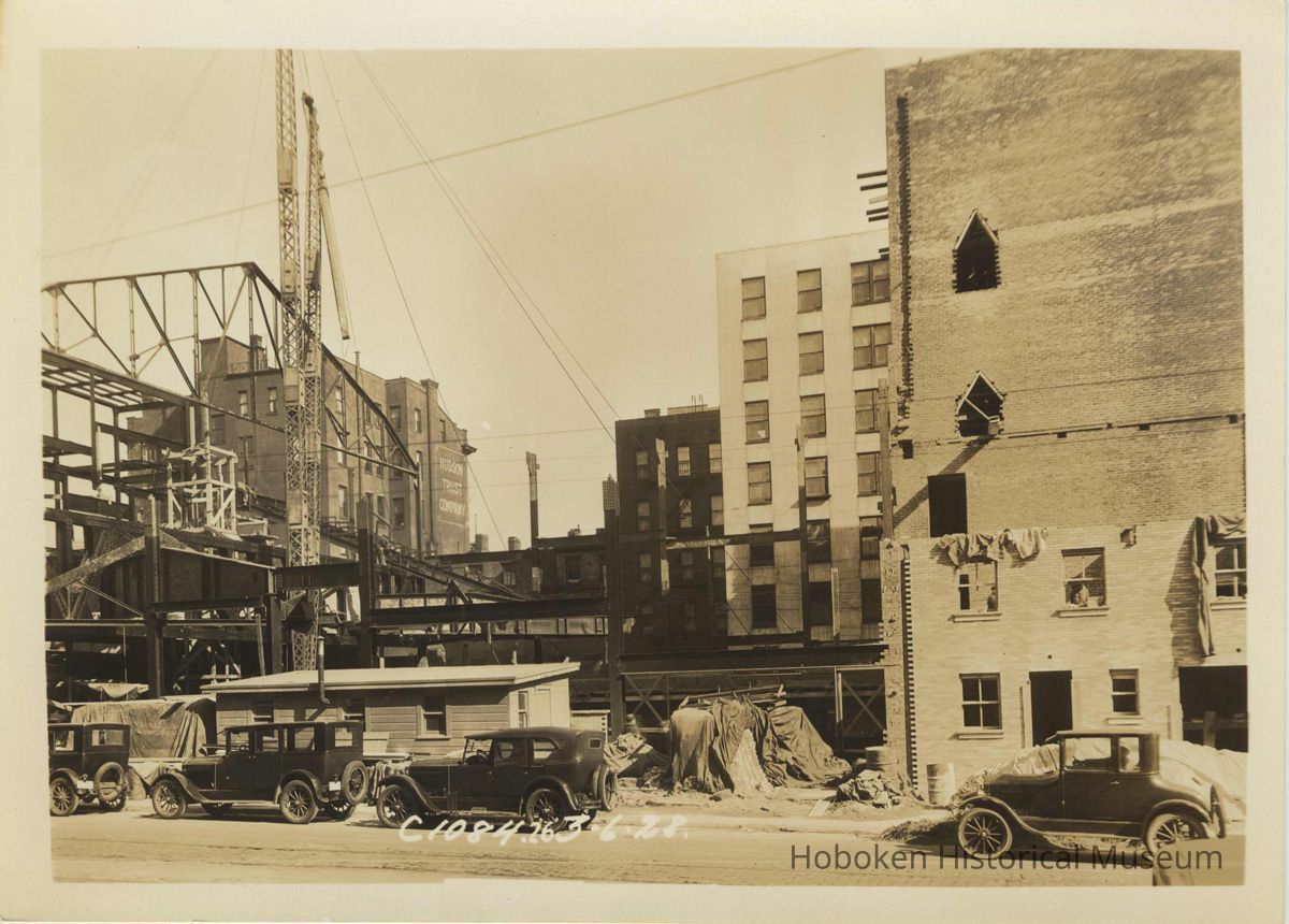 Sepia-tone photo of steel frame erection & fireproof stage house for the Fabian Theatre, Newark & Washington Sts., Hoboken, March 6, 1928. picture number 1