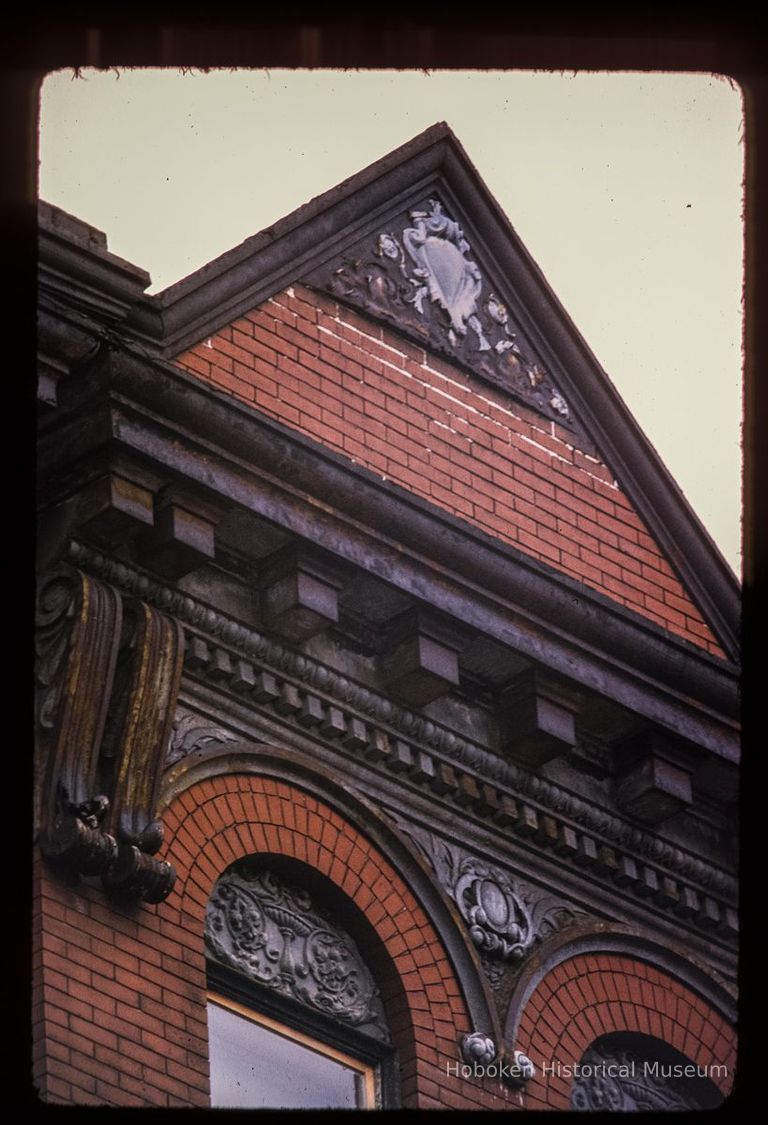 Color slide of detail view of pediment, cornice, bracket, dentils and brick semicircular arches at 814 Willow between 8th and 9th picture number 1