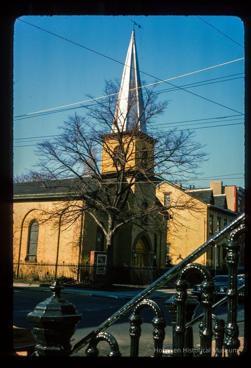 Color slide of eye-level view of Community Church of Hoboken façade and steeple at 600 Garden on the corner of Garden and 6th picture number 1