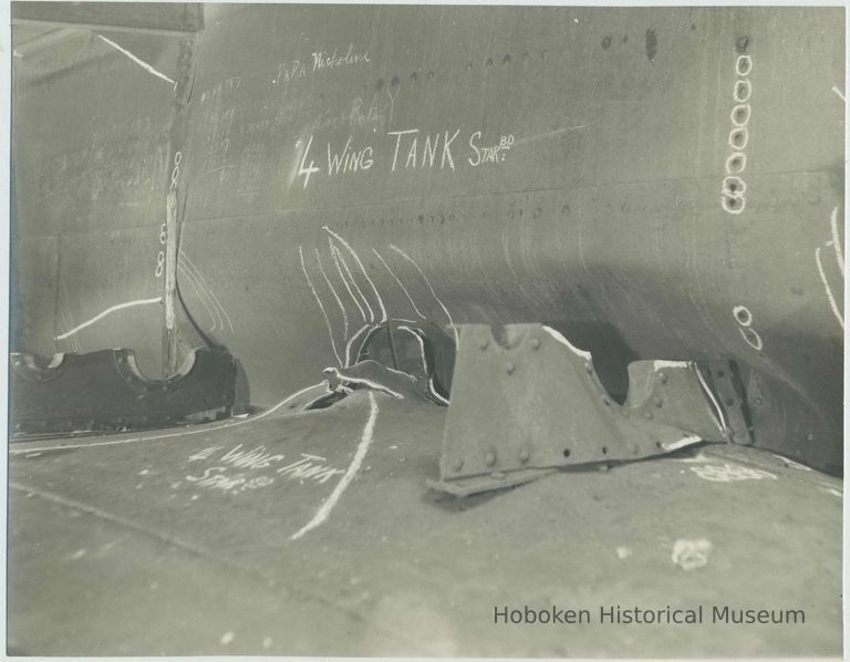 B+W photo of interior view of structural damage #4 wing tank starboard in an unidentified vessel at the Bethlehem Steel Shipyard, no date, ca. 1940. picture number 1