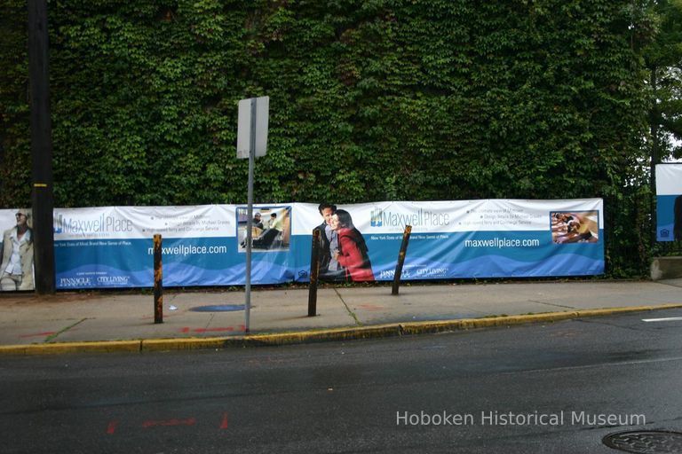 Digital color image of the Maxwell House Coffee plant site with printed vinyl fence sign banners, Hoboken, October 2004. picture number 1