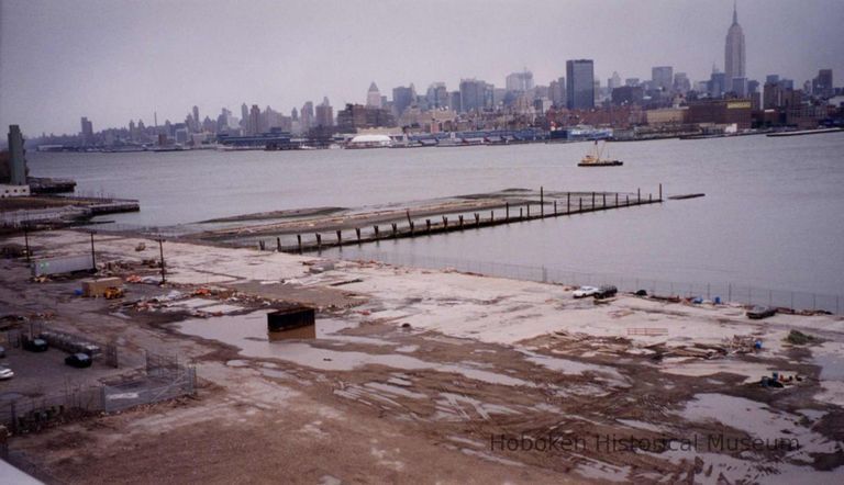 Color photo of an elevated view of the remains of a pier on the Hudson River at 4th Street, Hoboken, 1999. picture number 1