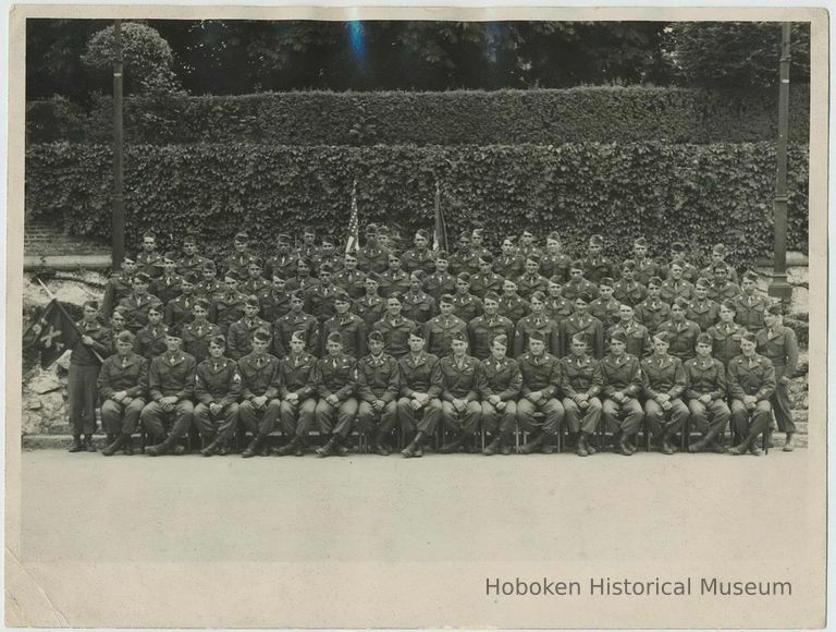 B+W group photo of an Army infantry company, no place, no date. Appears to be from World War II. picture number 1