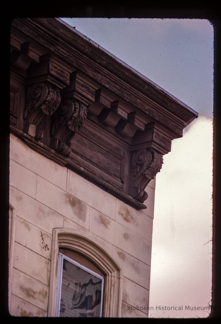 Color slide of detail view of cornice, brackets and frieze on an unidentified building at Hudson and 2nd picture number 1