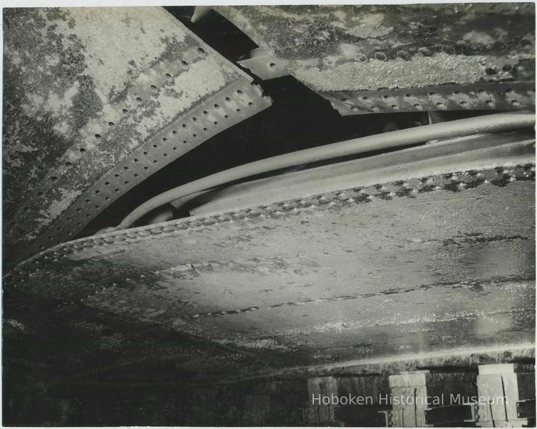 B+W photo of exterior view of damaged hull plates near keel on unidentified vessel at the Bethlehem Steel Shipyard, Hoboken Division, no date, ca. 19 picture number 1