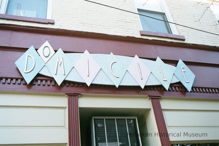 Color photo of wall sign for Domicile, 168 First Street, Hoboken, Jan. 3 & 4, 2002. picture number 1