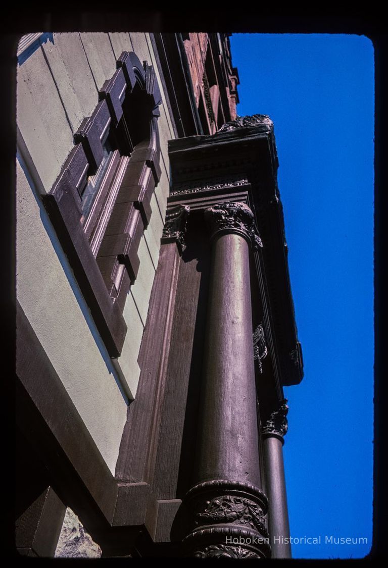 Color slide of detail view of portico, pillars, pediment and façade at 84 Washington on the corner of Washington and Newark picture number 1