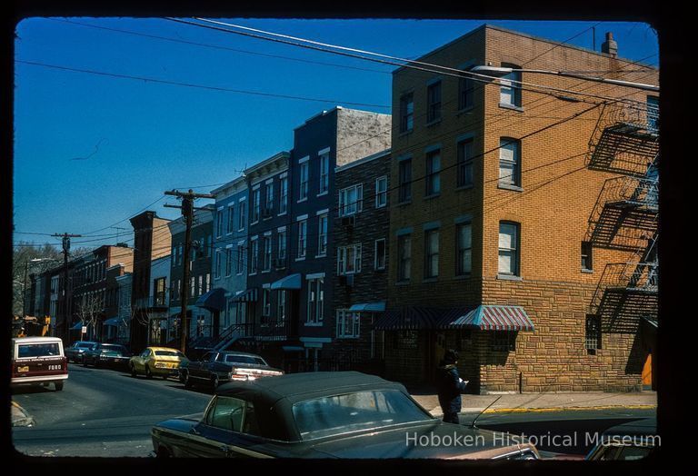 Color slide of eye-level view of row houses on the E side of Park between 3rd and 4th looking N picture number 1