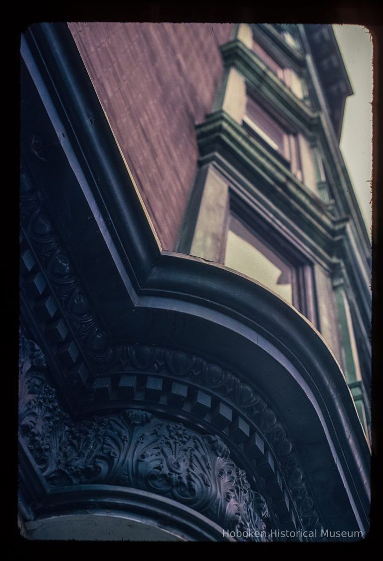 Color slide of detail view of cornice and bay windows at 217 10th on the SE corner of 10th and Park picture number 1