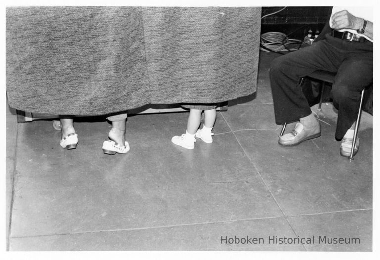 B+W photo of a woman and child in a voting book on election day, Hoboken, [June 11, 1985]. picture number 1