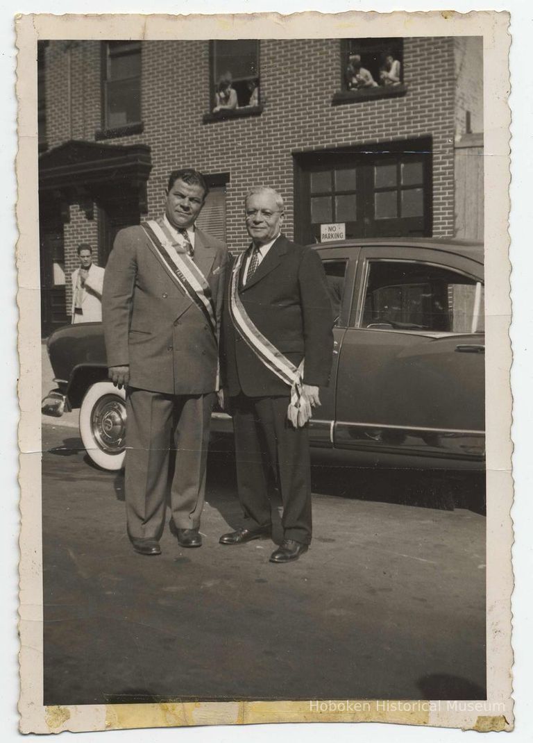 B+W photo of Dominic Pescatore (right) with unidentified man standing on street, Hoboken, no date, ca. 1950. picture number 1