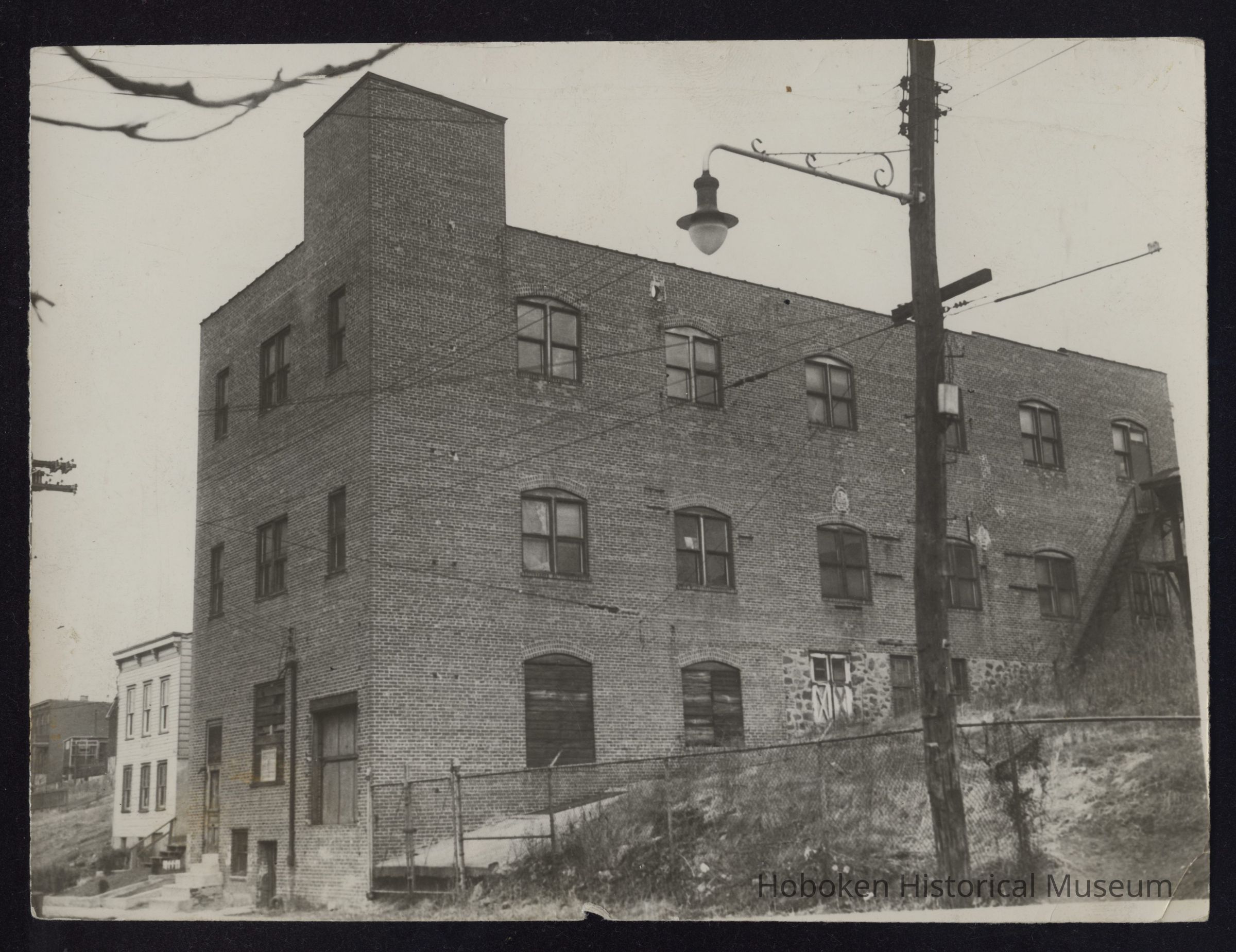B&W photo of industrial building at unknown location in New Jersey. picture number 1