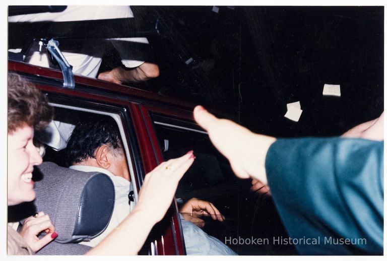 Color photo of mayoral candidate Tom Vezzetti in front seat of car on election night, Hoboken, [June 11, 1985]. picture number 1