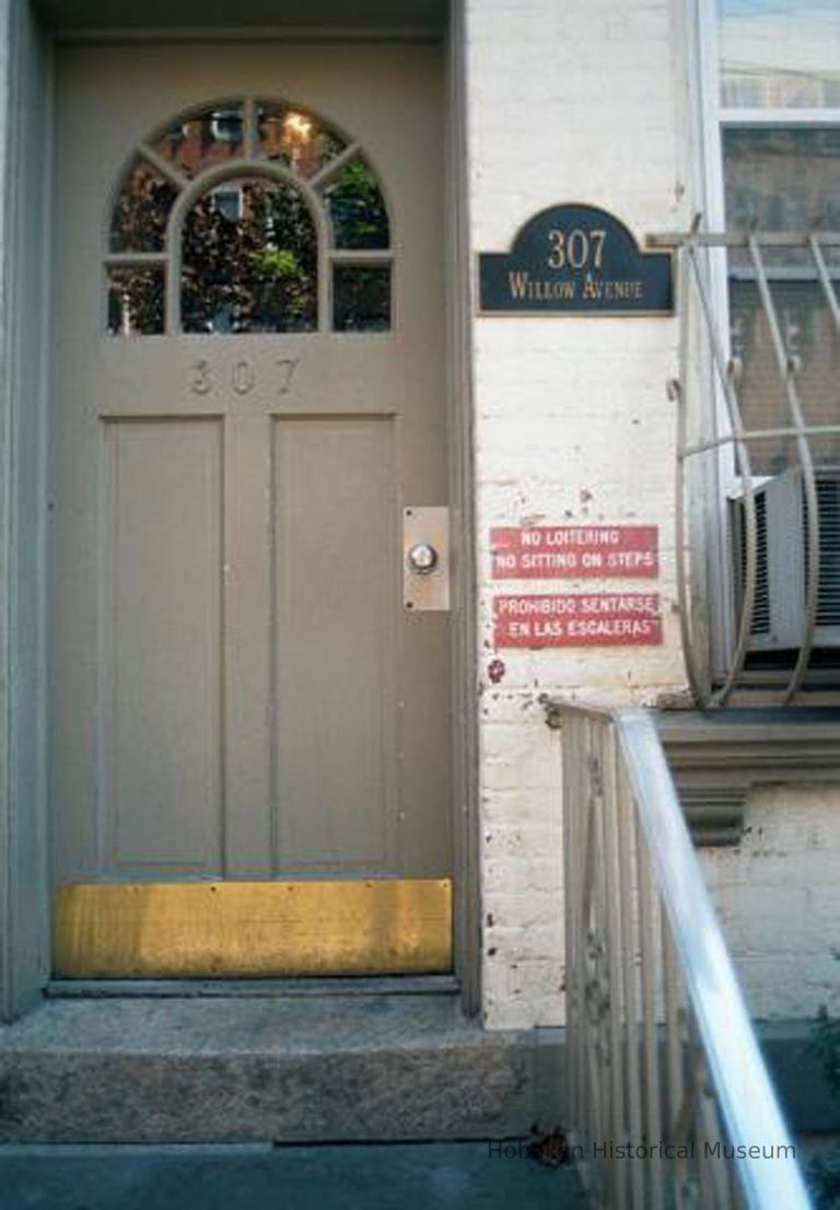 Color photo of three signs at the front entrance of 307 Willow Avenue, Hoboken, Sept., 1-5, 2001. picture number 1