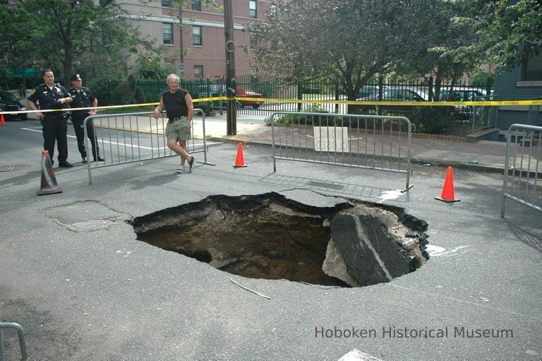 Color photos, 10, of a sinkhole on Bloomfield Street between Observer Highway and Newark St., Hoboken, July 8, 2006. picture number 1