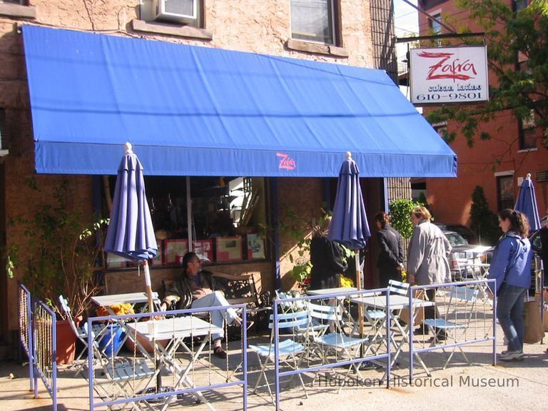 Digital copy of color photo of food tour members outside Zafra Kitchen, 301 Willow Ave., Hoboken, Oct. 18, 2003. picture number 1