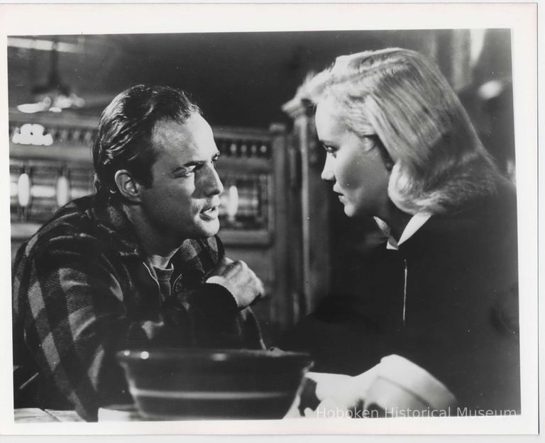 B+W publicity photo of Marlon Brando as Terry Malloy, Eva Marie Saint as Edie Doyle in film 