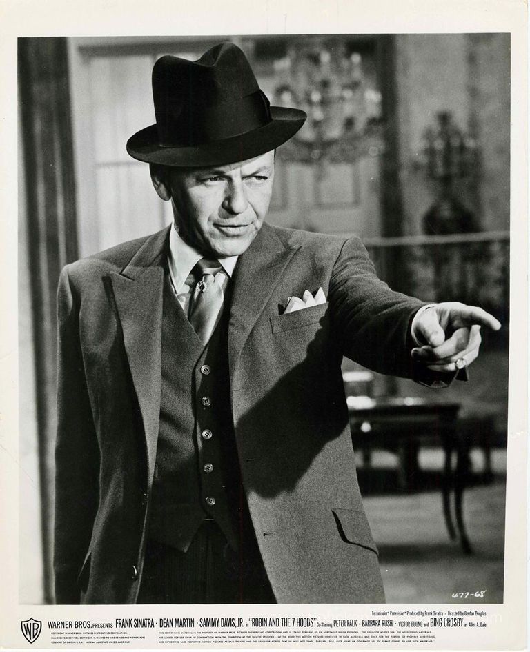 Black-and-white photo, movie still with caption, of Frank Sinatra in the film 