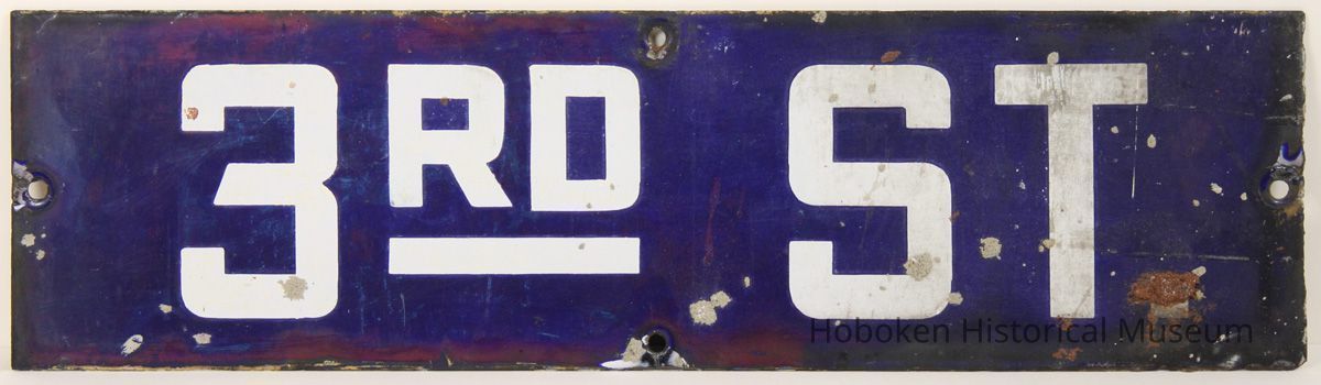 Enameled metal street sign, 