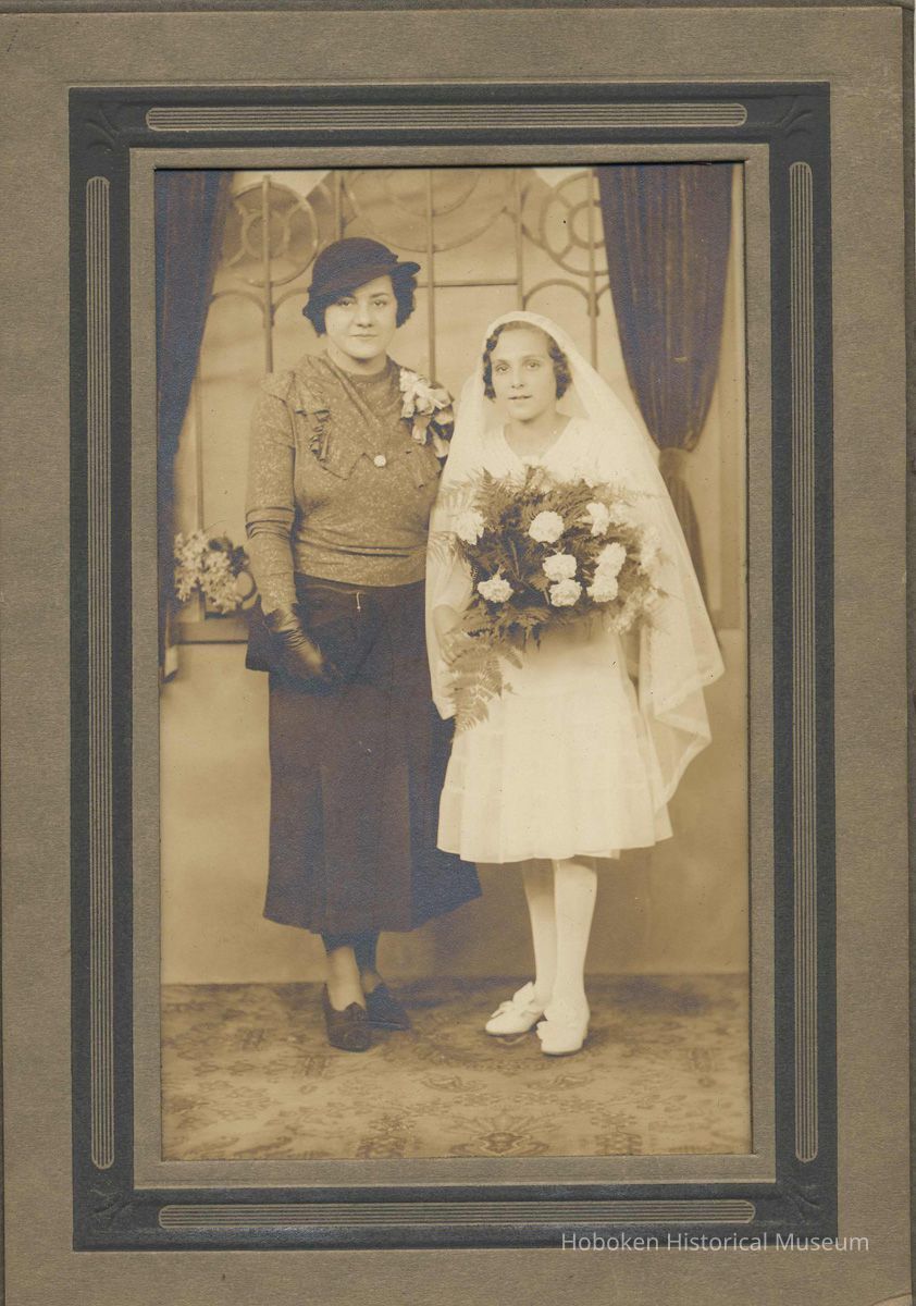 Sepia-tone studio photo of Mildred Marion 