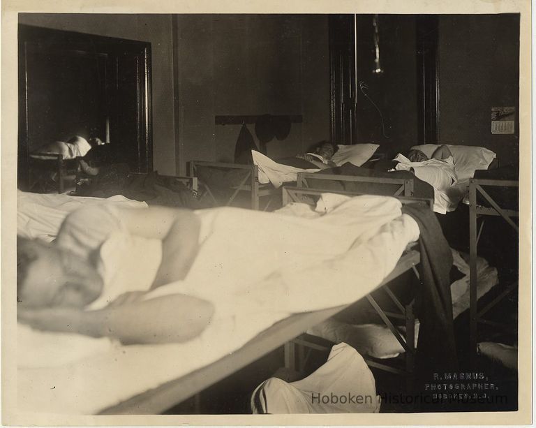 B+W photo of men sleeping in bunk beds at the Hoboken YMCA, Hoboken, n.d., ca. 1918-1921. picture number 1