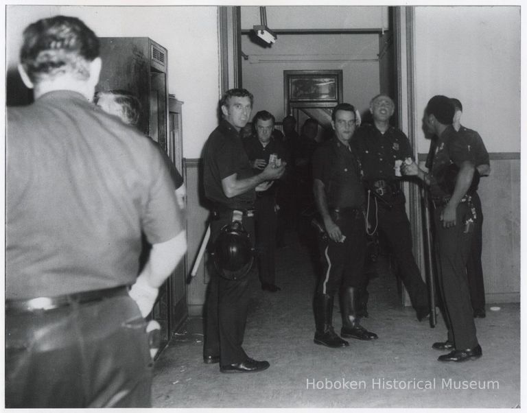 B+W printof Hoboken Police officers at Police Headquarters during state of emergency, Hoboken, ca. 1970-1971. picture number 1