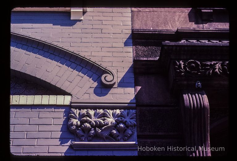 Color slide of detail view of pediment, bracket, gauged arch and decorative tile on adjoining buildings on Bloomfield between 7th and 8th picture number 1