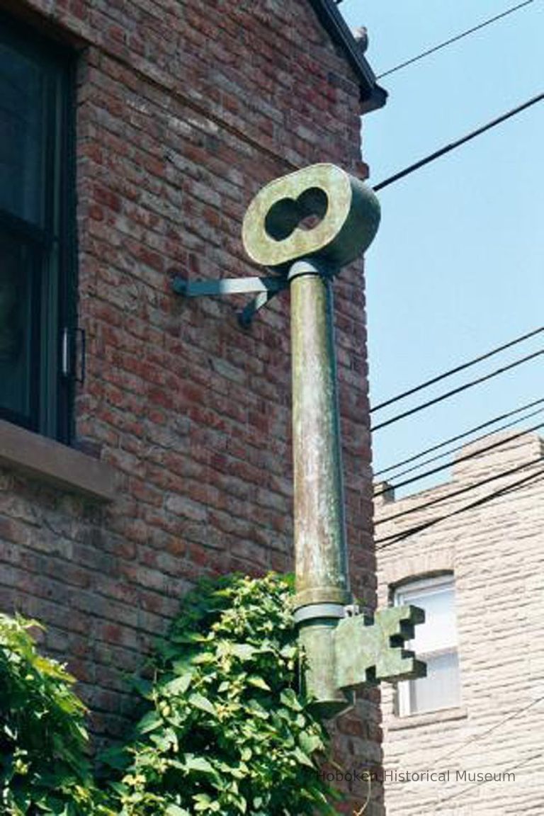 Color photo of hanging metal key sign on 63 Willow Terrace, Hoboken, Sept., 1-5, 2001. picture number 1