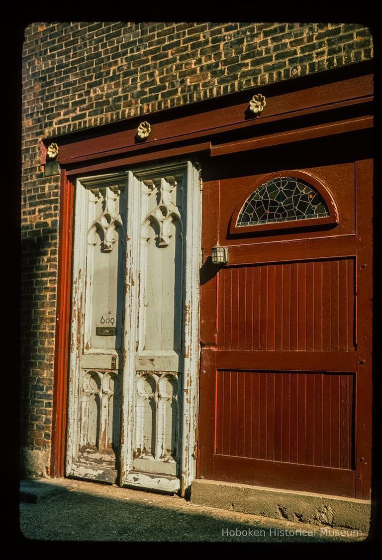 Color slide of close-up view of carriage house façade at 609 Court between 6th and 7th picture number 1