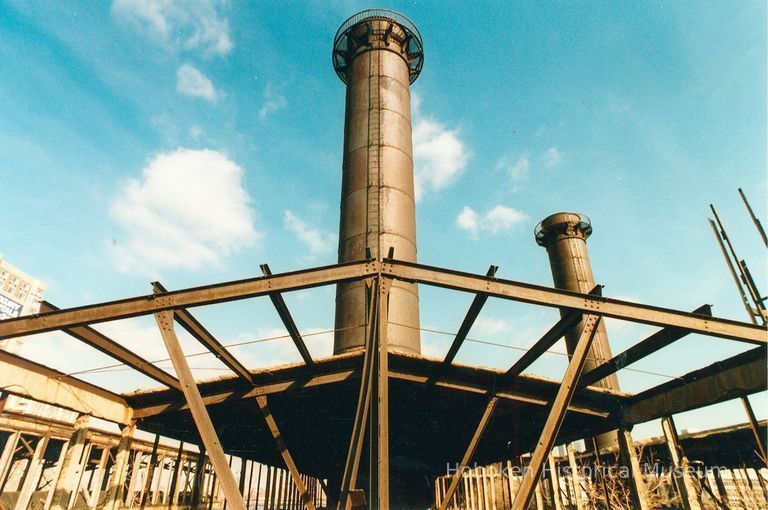 Digital image of color photo on the exterior roof with smokestacks of the former Hudson & Manhattan Rail Road powerhouse, Jersey City, March, 2000. picture number 1