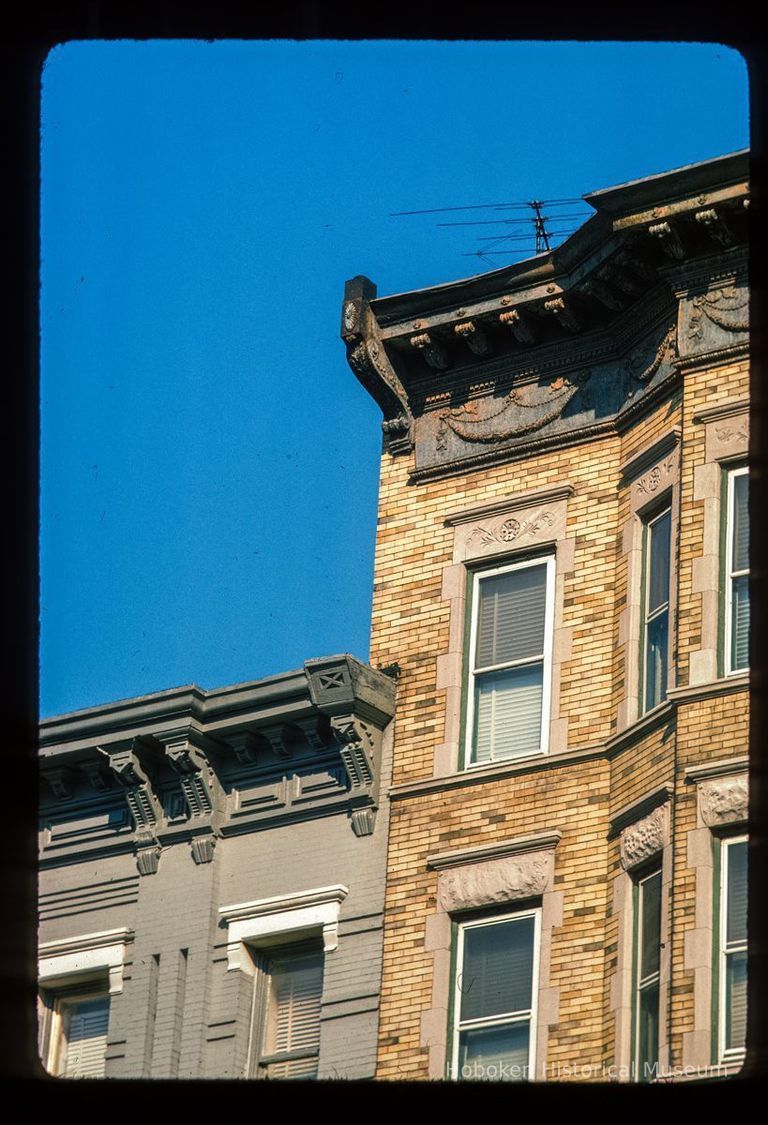 Color slide of detail view of cornices, brackets and bay windows at 815 and 817 Washington between 8th and 9th picture number 1