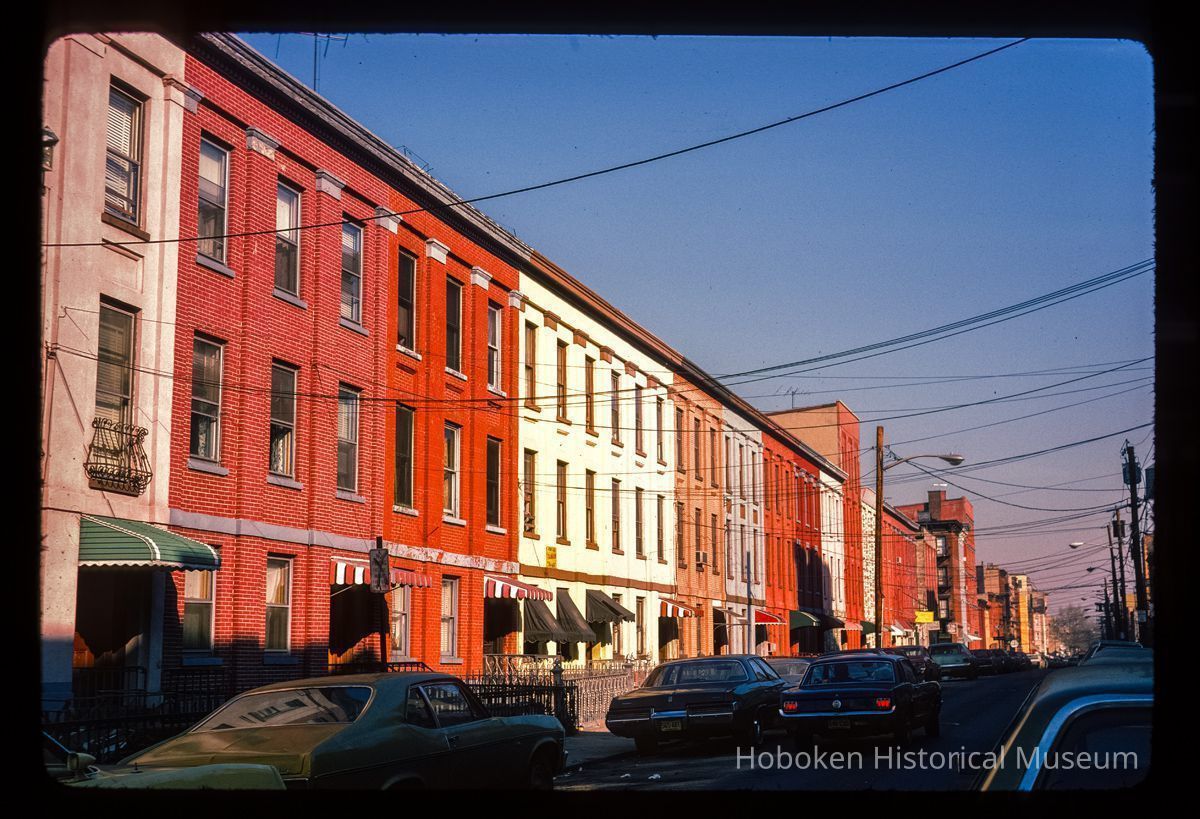 Color slide of eye-level view of row houses on an unidentified street, possibly Bloomfield picture number 1