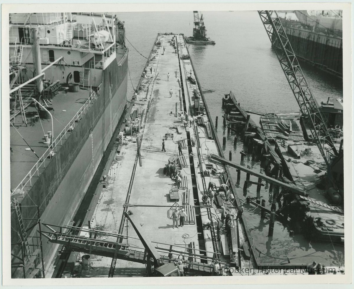 B+W photo of the construction of Pier 5 (formerly Pier 14) at the Bethlehem Steel Shipyard, Hoboken Division, Sept. 18, 1957. picture number 1