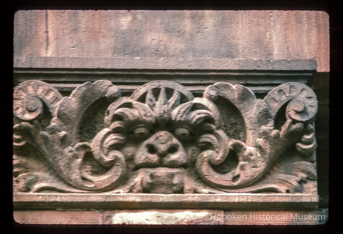 Color slide of close-up view of decorative tile on a building on Bloomfield between 10th and 11th picture number 1