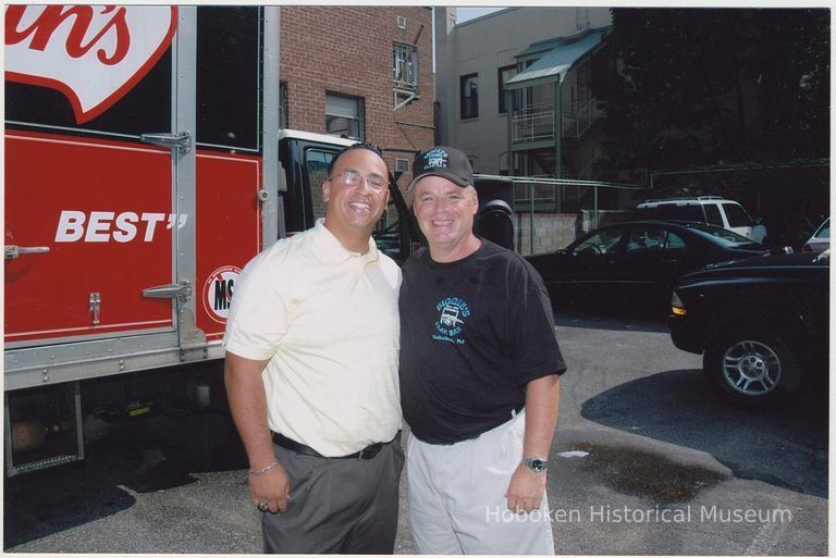 Color photo of Steve Ranuro (right) with a man at Biggie's Clam Bar 60th anniversary, Hoboken, Sept. 17, 2006. picture number 1