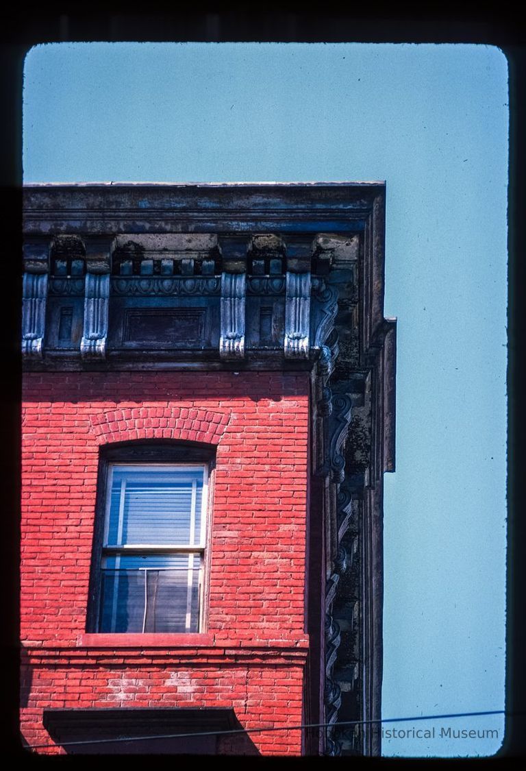 Color slide of detail view of cornice, brackets, frieze and gauged arch window head at 240 Garden on the SW corner with 3rd picture number 1