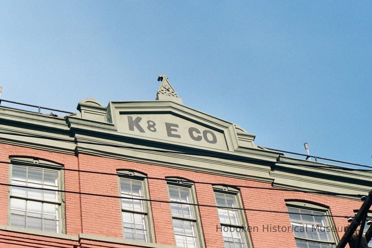 Color photo of painted sign on building: K & E Co. (Keuffel & Esser), Third St. between Adams and Grand Sts., Hoboken, Jan. 3 & 4, 2002. picture number 1