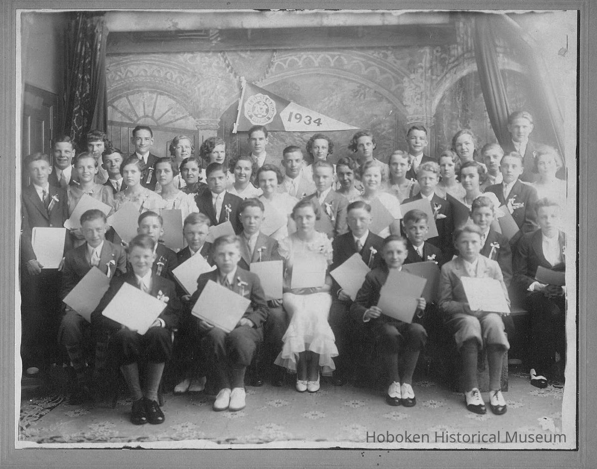 Group photo of children and teenagers at St. Mary's Parochial School ceremony. picture number 1