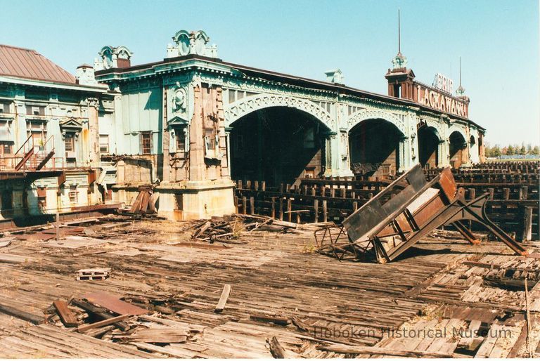 Digital image of color photo of of the abandoned Hudson River ferry slips of the Hoboken Terminal, Hoboken, Sept., 1999. picture number 1