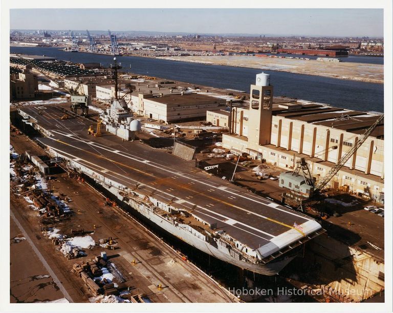 U.S.S. Intrepid in graving dock, Military Ocean Terminal, Bayonne; adjusted