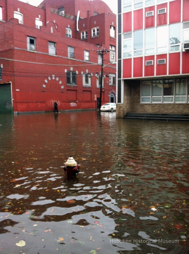 flooding at corner of Clinton and Eighth Streets