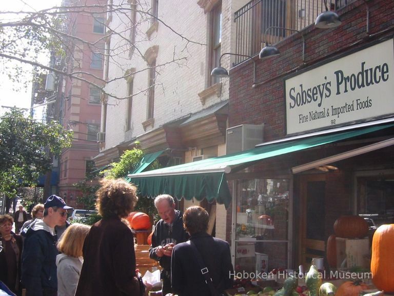 Digital copy of color photo of tour members outside Sobsey's Produce, 92 Bloomfield St., Hoboken, Oct. 18, 2003. picture number 1