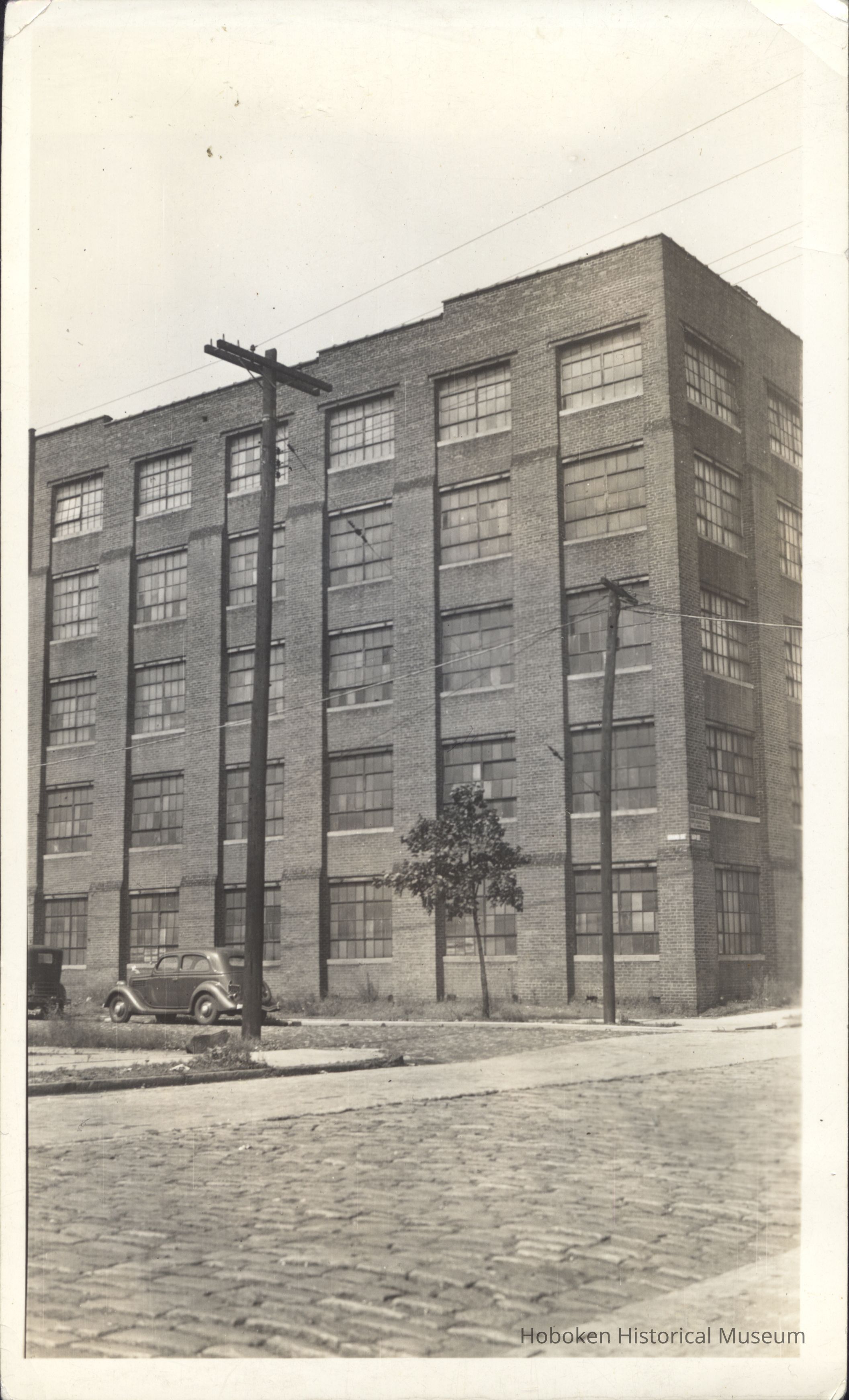 B&W photo of industrial building at the SW corner of 15th Street and Grand Street, Hoboken. picture number 1