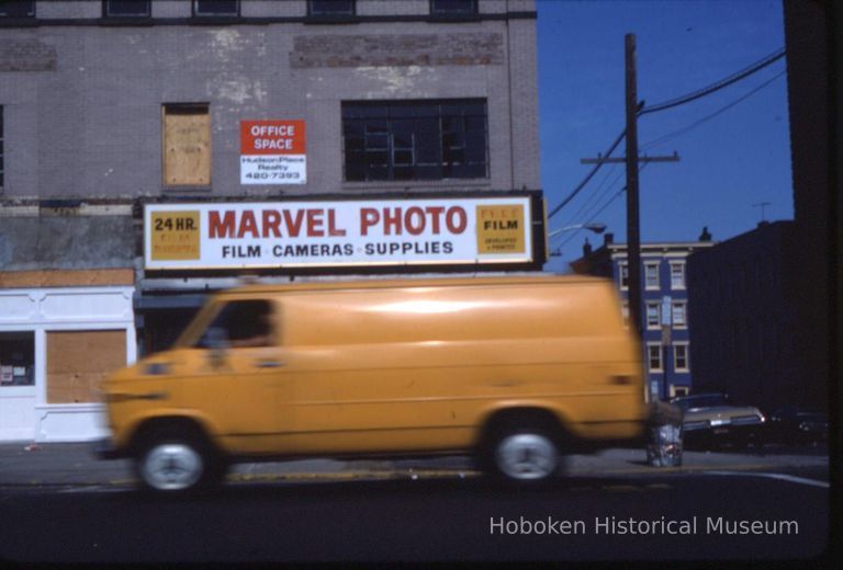 Color slide of the storefront of Marvel Photo, 134 Washington St., Hoboken, 1983. picture number 1